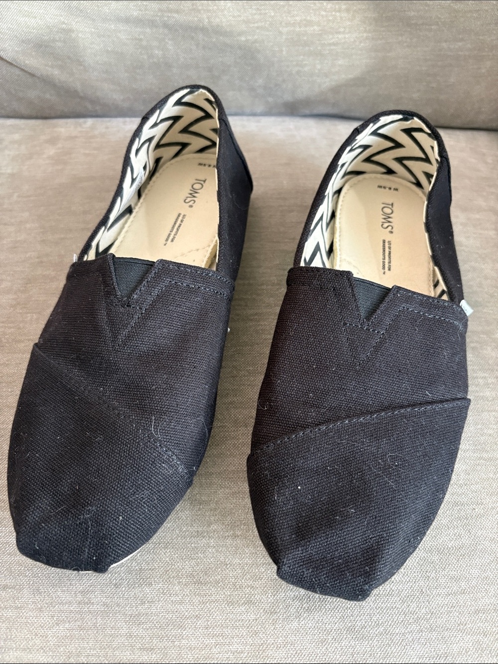 Toms Women’s Black Canvas Slip-On Sneakers
